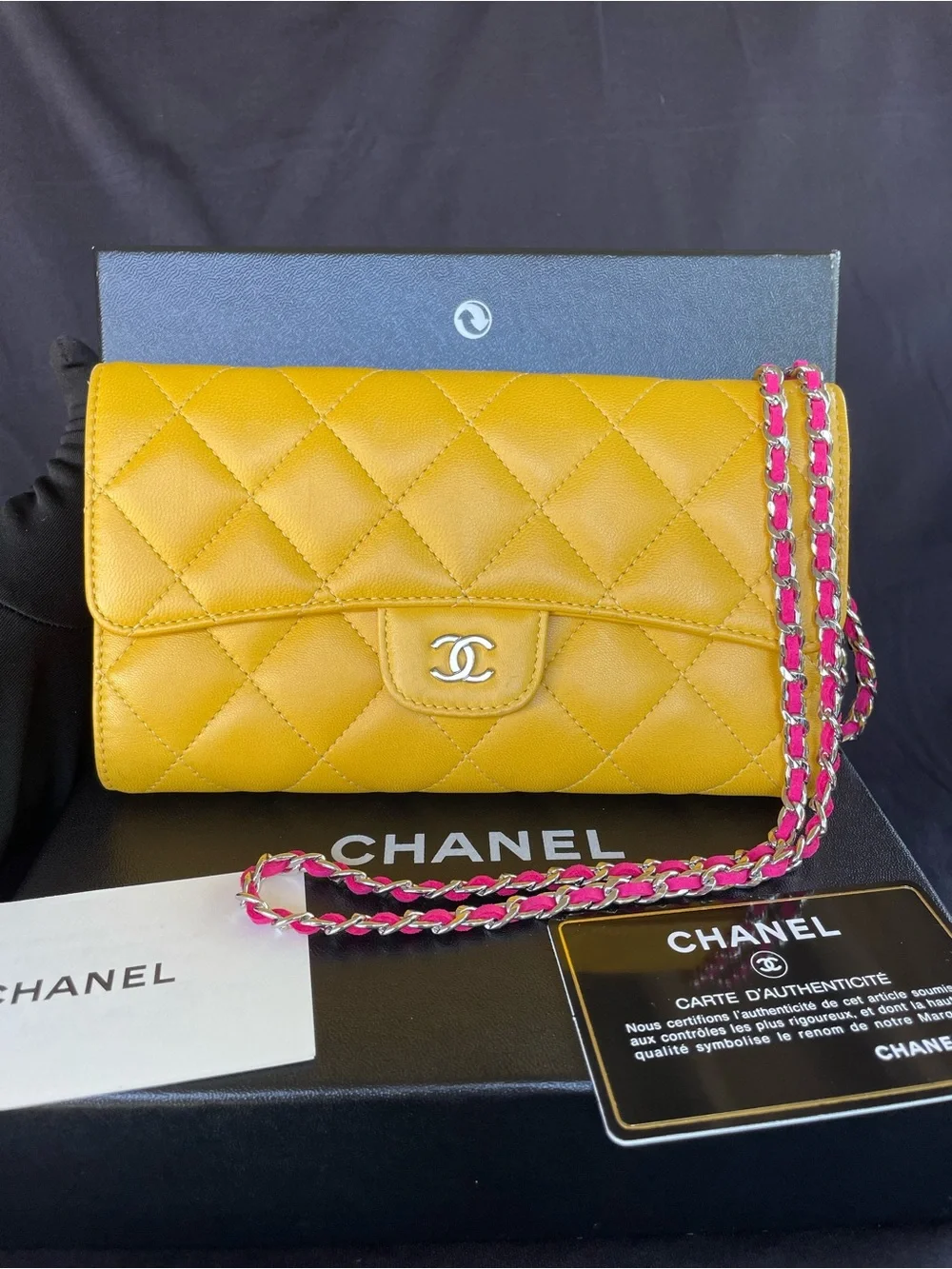 AUTH. Chanel Flap trifold wallet with silver tone hardware.